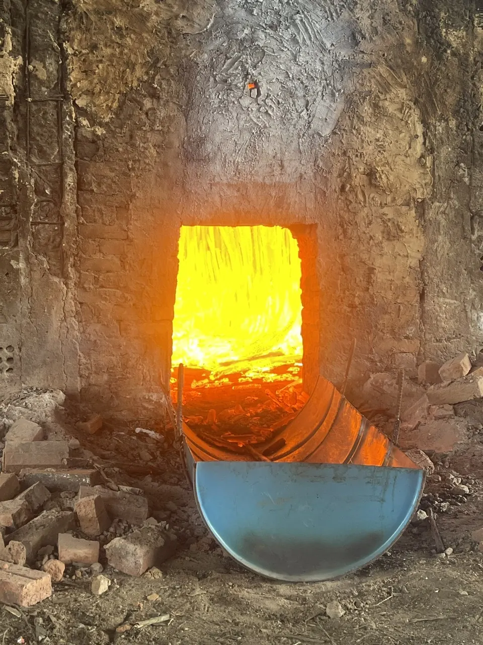 Traditional charcoal kiln firing at KAOLA production facility in Vietnam