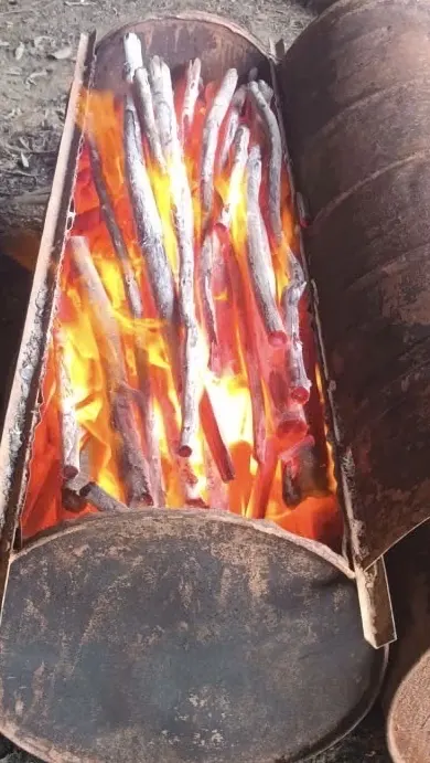 Eucalyptus Binchotan white charcoal burning during a KAOLA product demonstration