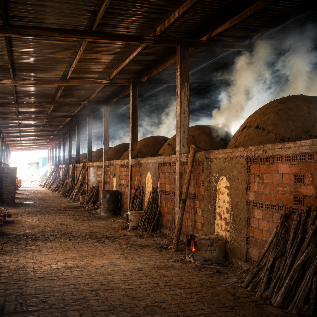 Charcoal kilns under the production workshop roof from the KAOLA image library