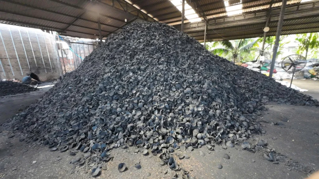 Loose coconut-shell charcoal stored in a KAOLA warehouse