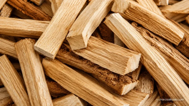 Close-up of split firewood pieces with a charcoalkaola.com watermark